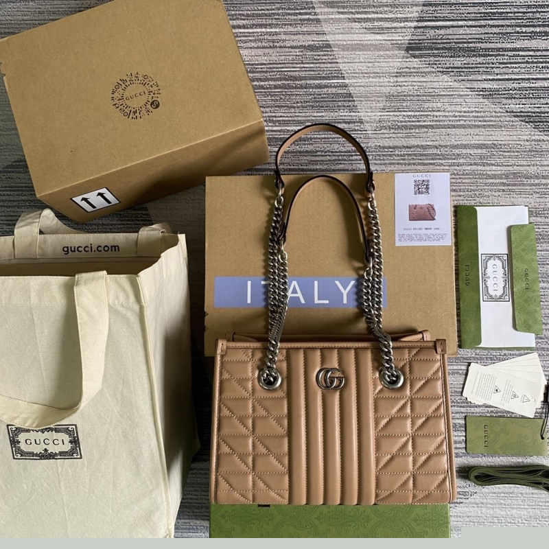 G*u*i shopping bags